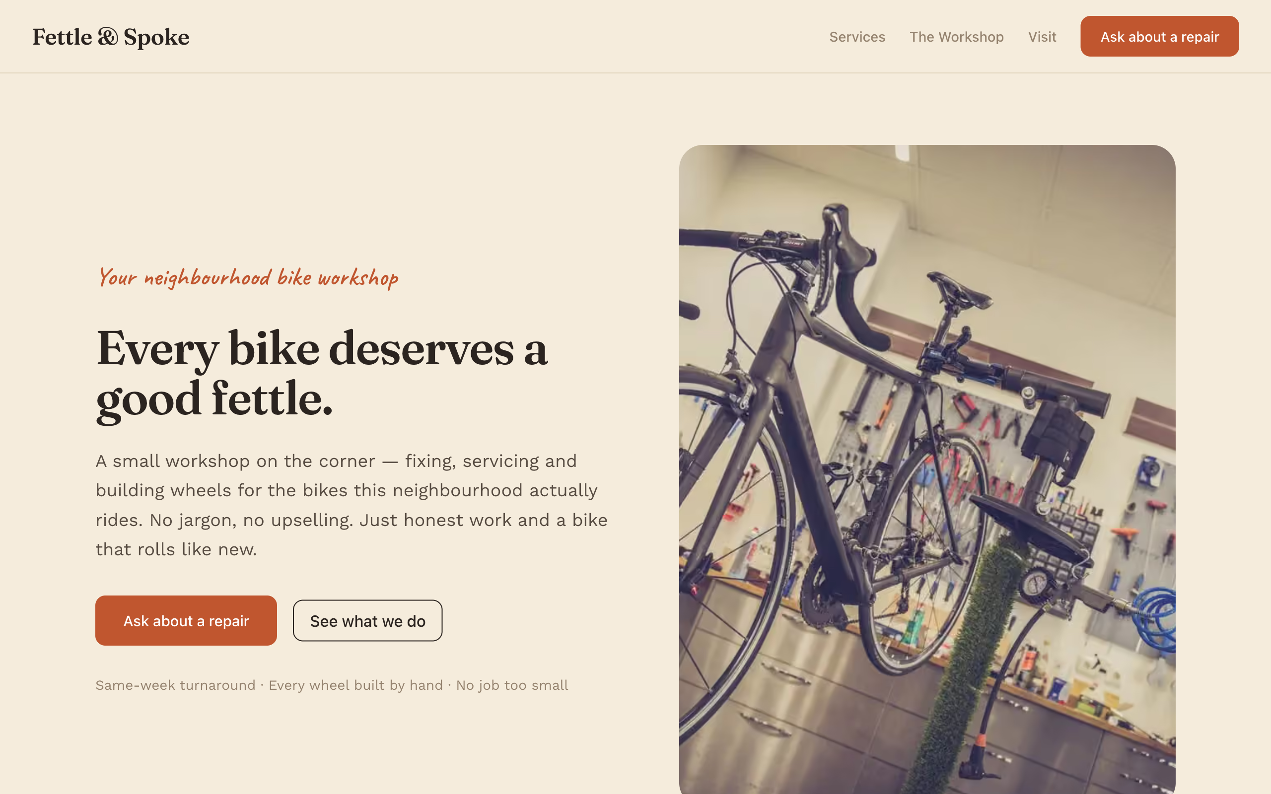 The Fettle & Spoke site Claude built — a warm cream layout with the serif headline "Every bike deserves a good fettle.", a handwritten accent line, a terracotta "Ask about a repair" button and a photo of a road bike in a workshop stand.